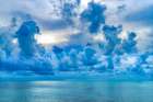 Cloudscape-Moorea-Tahiti-French Polynesia. Blue colors in water in lagoon and coral reefs Art Print